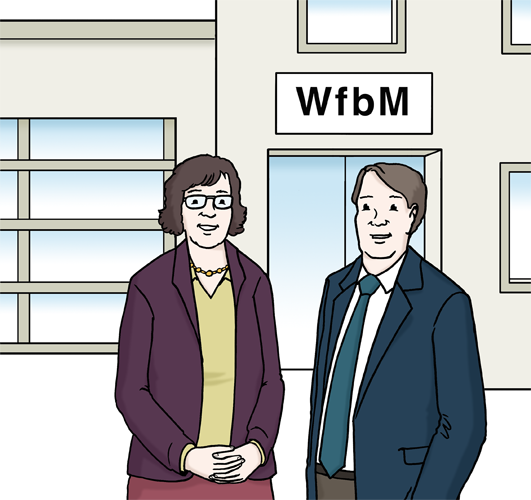 Auf dem Bild sind eine Frau und ein Mann zu sehen. Vor einer Werkstätte von Menschen mit Behinderung.